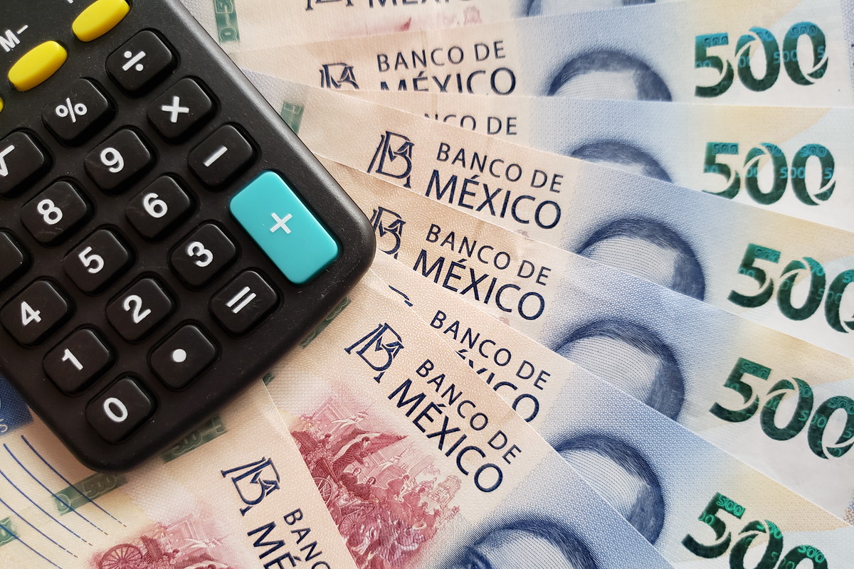 Calculator with Mexican banknotes