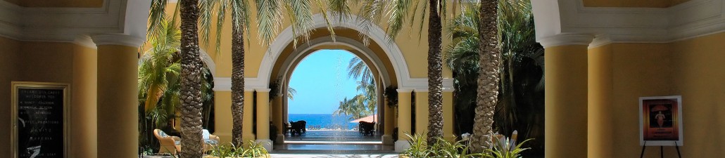 View through colonial arches to the ocean