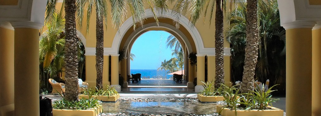 View through colonial arches to the ocean