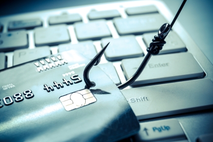 Bank card and fishing hook safety and risk concept