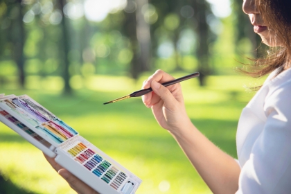 Mixing new colors on a paint palette