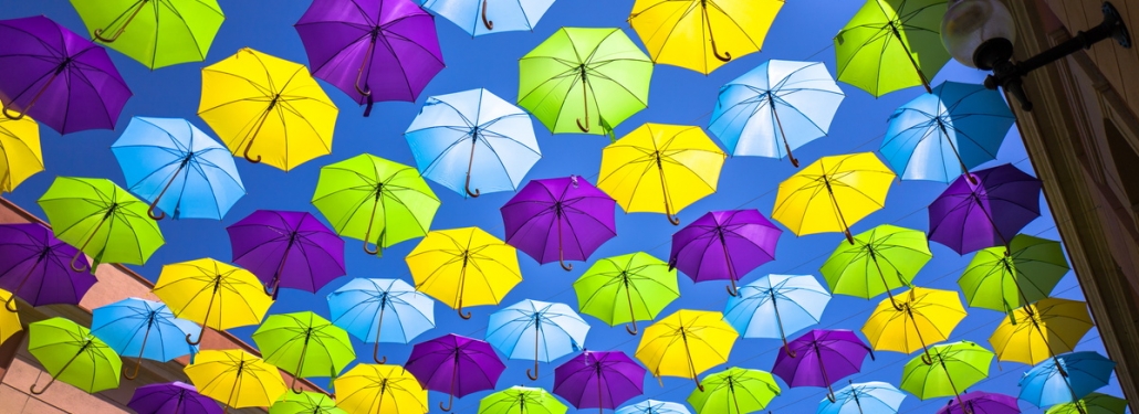 Colorful umbrellas covering a street