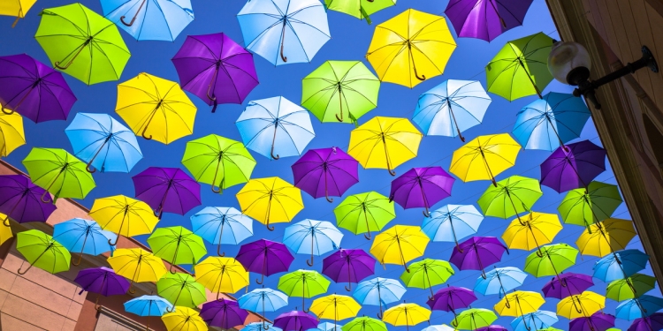 Colorful umbrellas covering a street