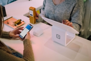 Making payment at a store using a smartphone
