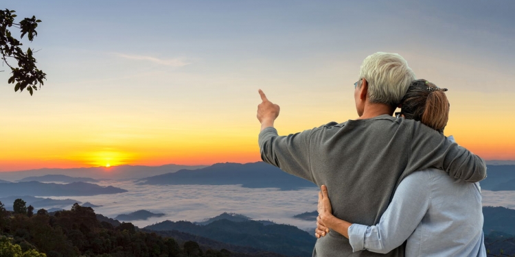 Couple looking across a mountain view