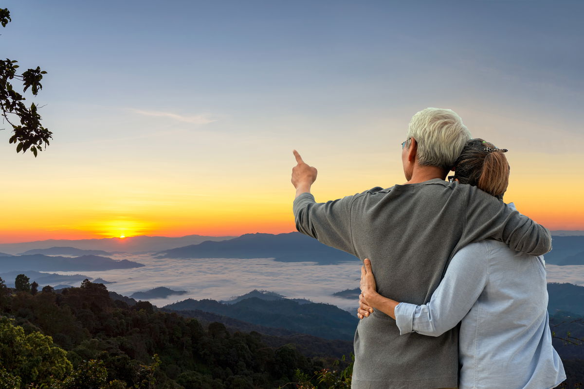 Couple looking across a mountain view