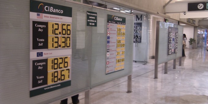 The Value Of Mexico S Peso Mexperience Currency Exchange Booths At Mexico City S Airport