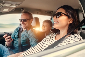 Family traveling inside a road vehicle