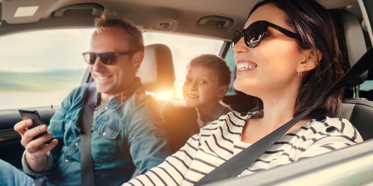 Family traveling inside a road vehicle