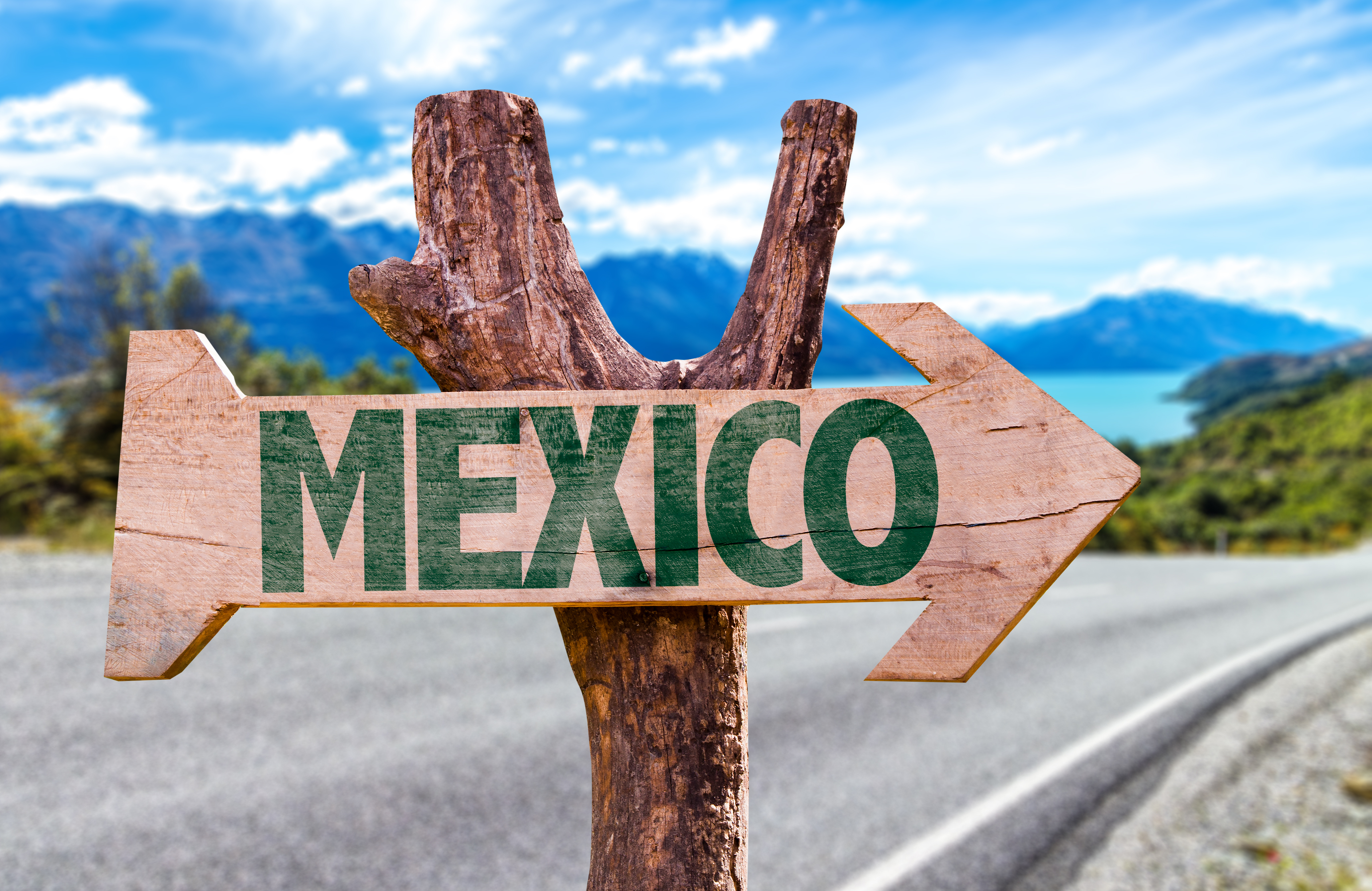Sign Pointing to Mexico