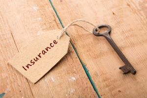 Insurance tag on a traditional door key