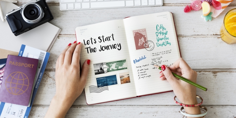 Writing in a life journey notebook