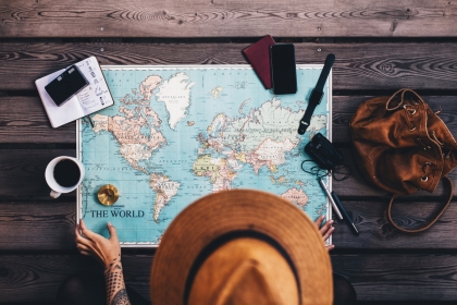 Person looking at a world map