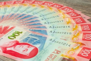 100 peso Mexico banknotes in a fan shape