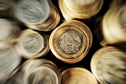 Mexican pesos in a stack