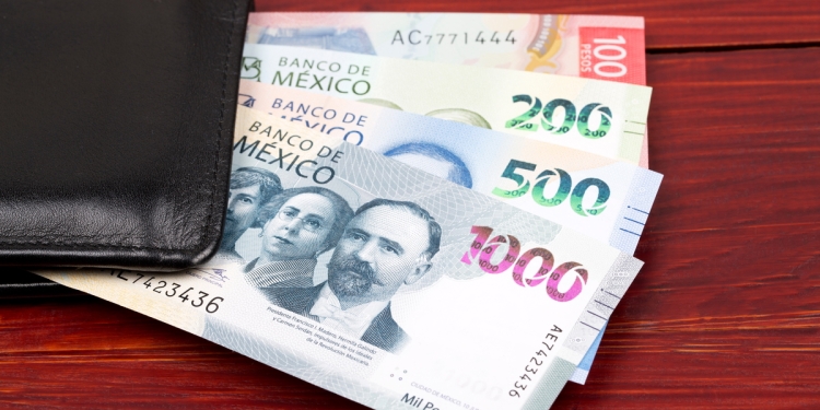 A collection of Mexican banknotes in a wallet