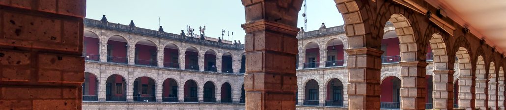 Corridor of Mexico's National Palace overlooking the central courtyard