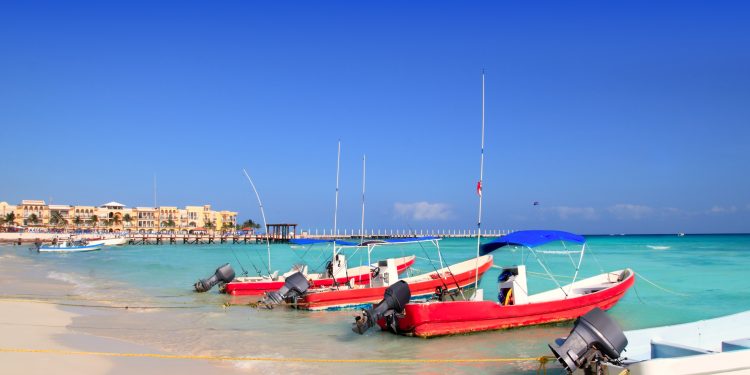 Boats on the shore at Playa del Carmen in Mexico