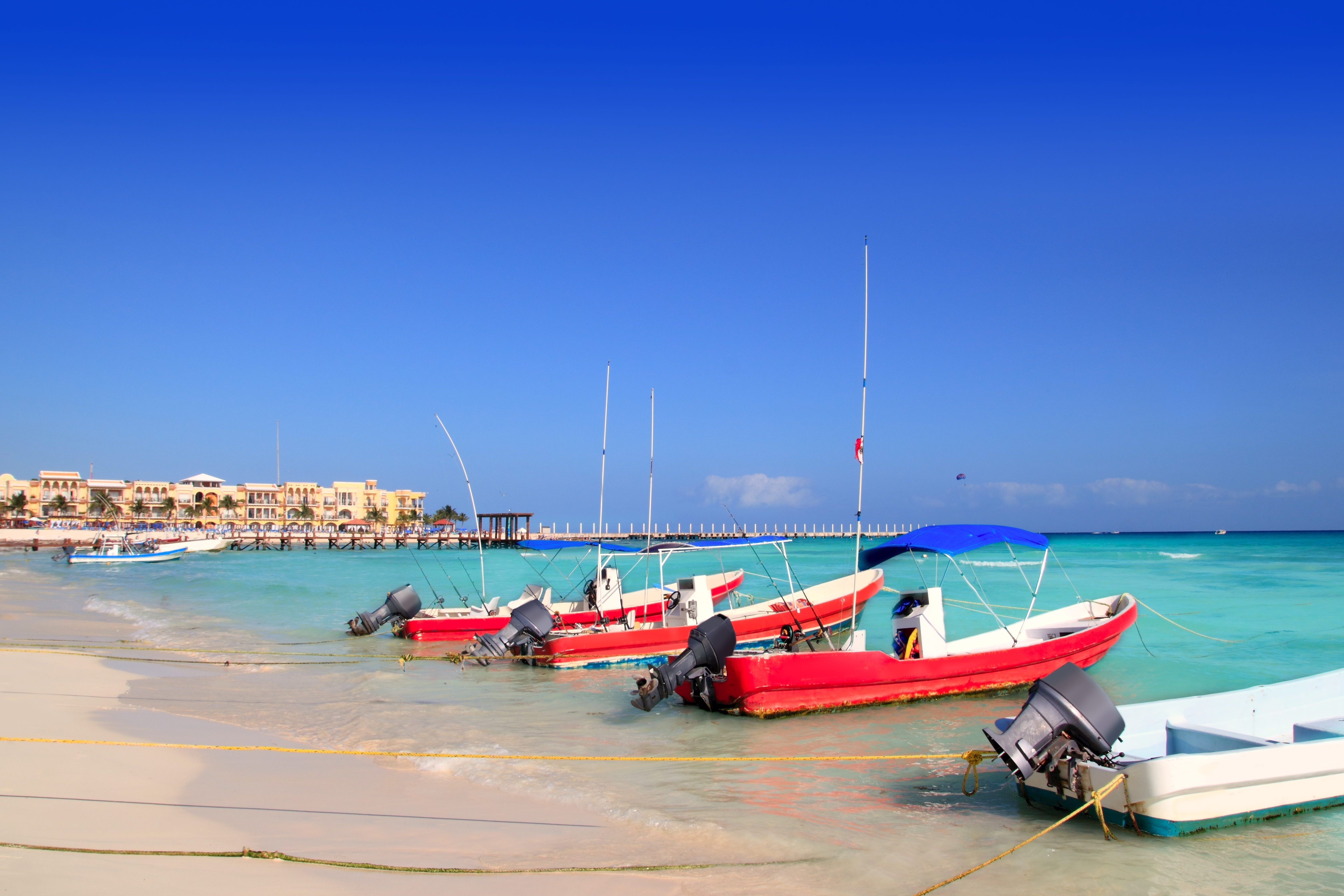Boats on the shore at Playa del Carmen in Mexico