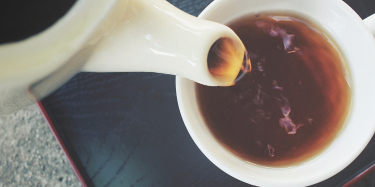 Pouring black tea