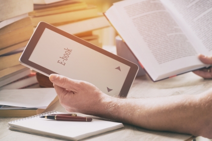Person reading an eBook on a Tablet