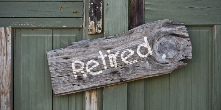 Retired sign on a wooden door