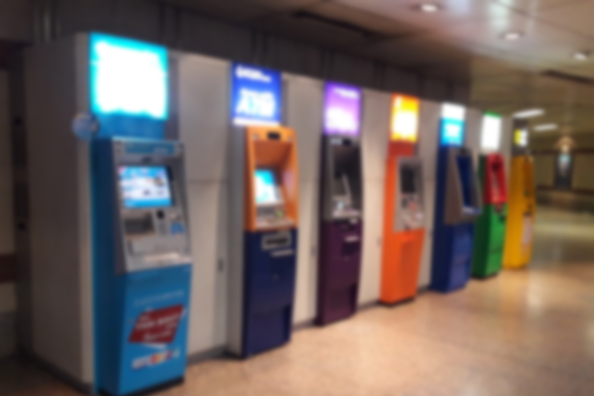 Row of ATMs in a hallway, blurred, concept picture