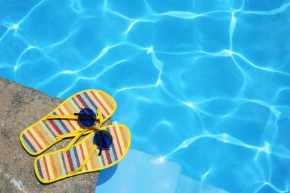 Shoes by the swimming pool