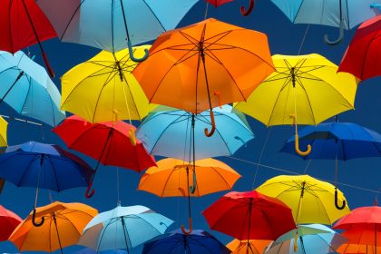 Umbrellas Covering Sky
