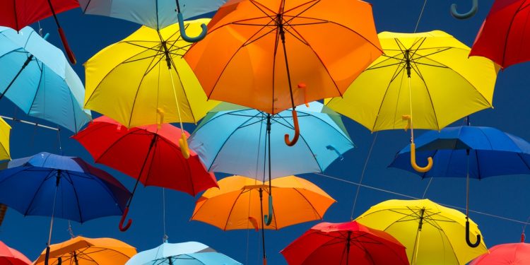 Umbrellas Covering Sky