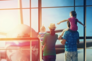 Family waiting at airport gate