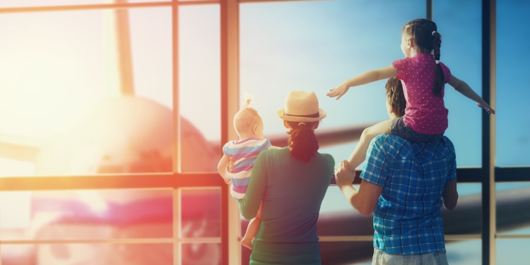 Family waiting at airport gate